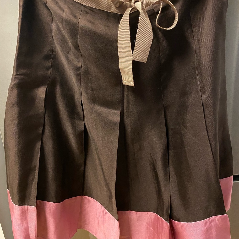 Get pleated silk skirt